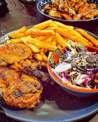 Photo of Nando's Kettering - Unit B2, KETTERING RETAIL PARK, Carina Rd, Kettering NN15 6YA